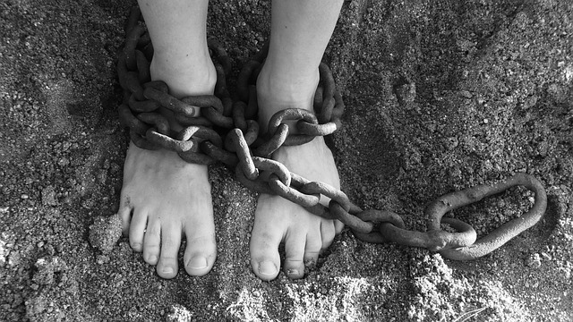 Feet wrapping in chains
