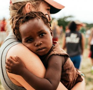 Woman holding child