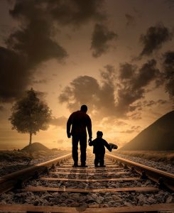 Father and son walking together.
